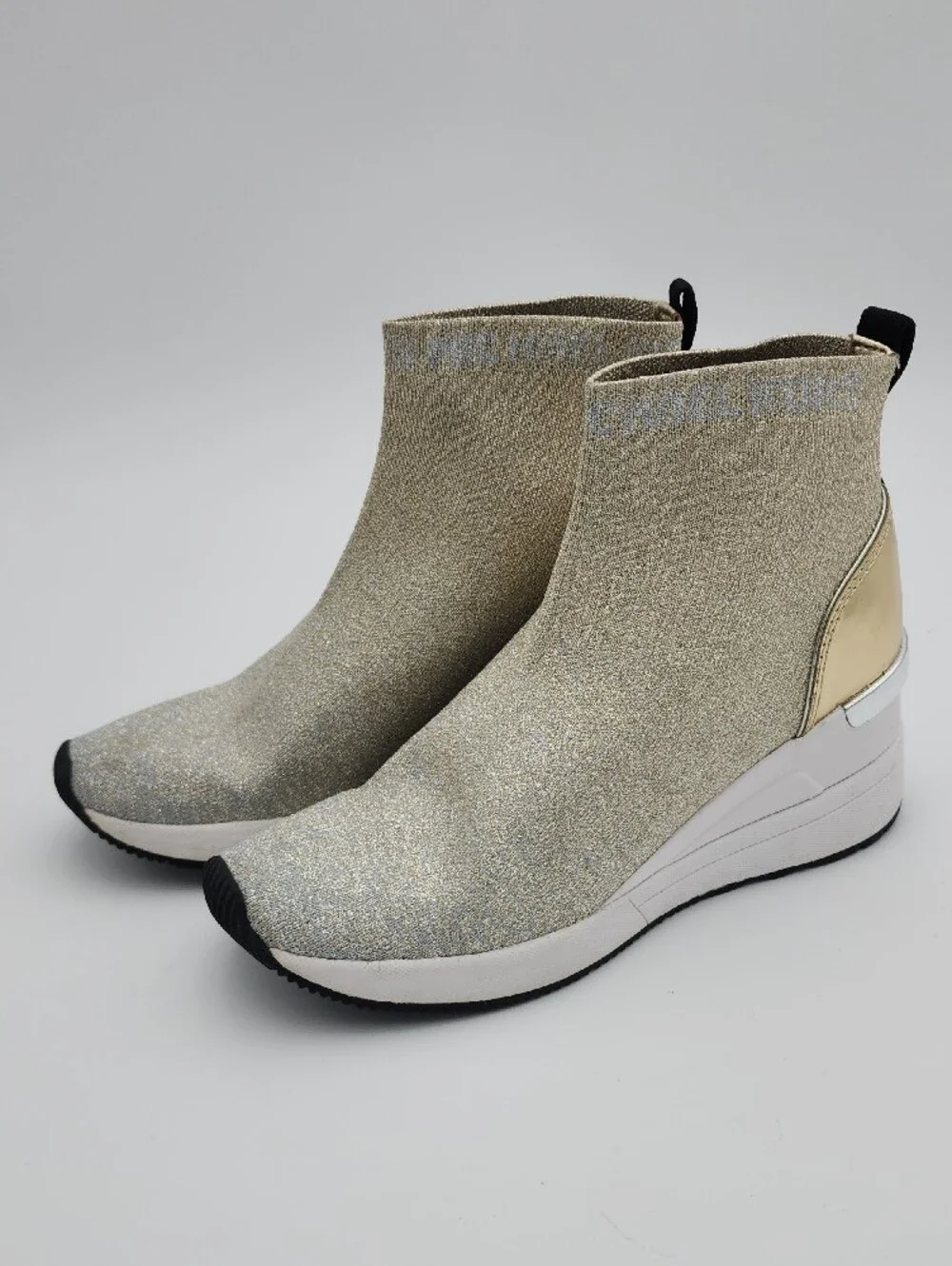Michael Kors Size 6 Women's Metallic Knit Slip-On Sneakers‎ - Gold And Silver